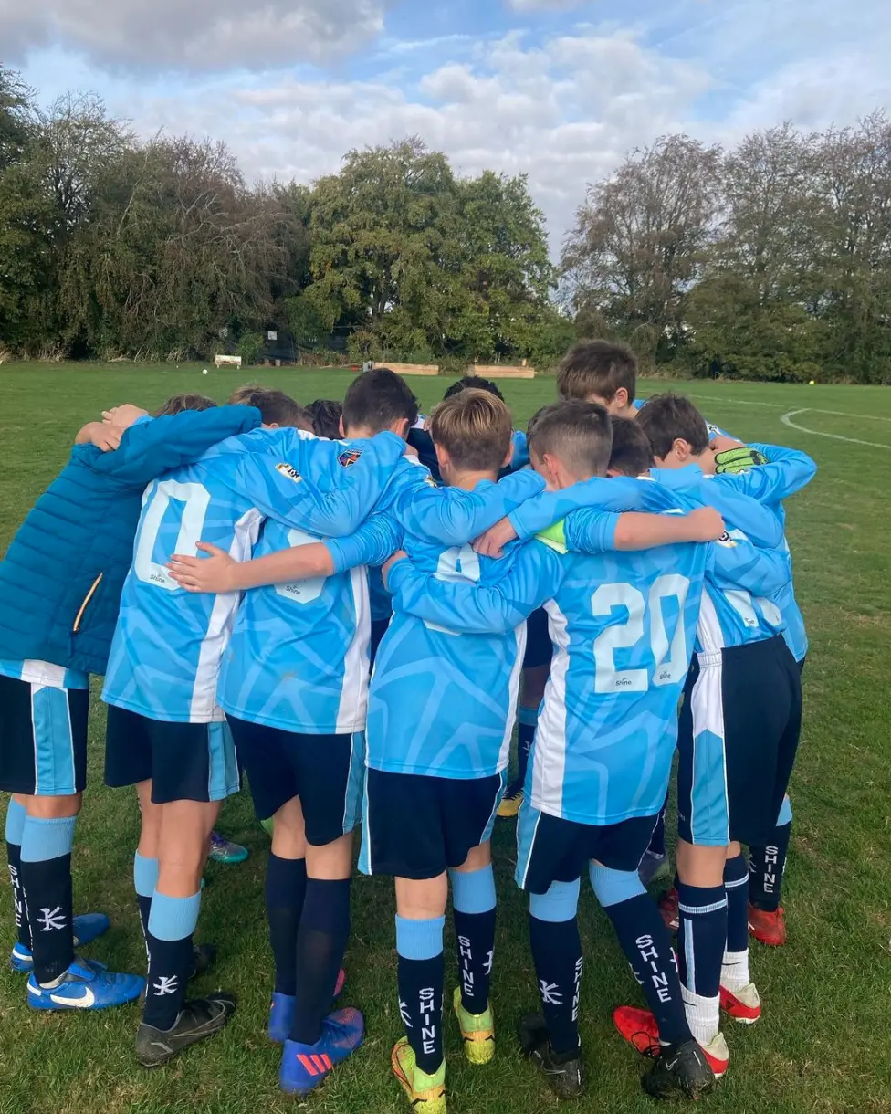 Boys in a huddle