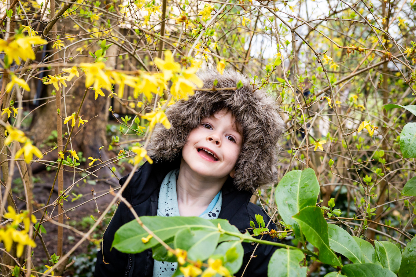 Boy having fun at forest school